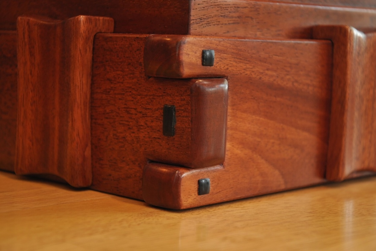 Detail of the mahogany blanket chest